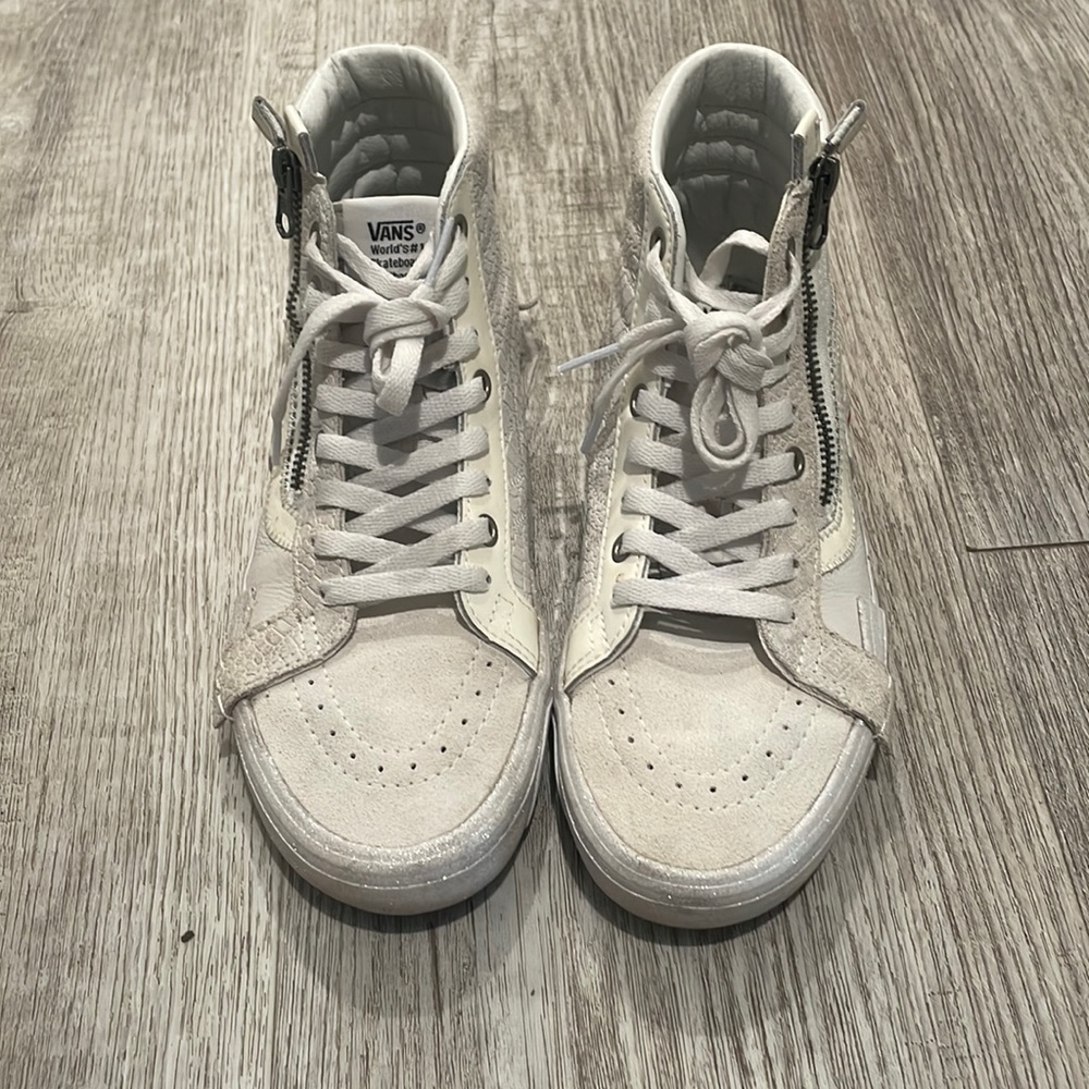 Women’s white high-top Vans